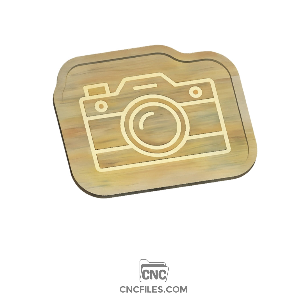 An image of a CNC file showing a camera-shaped cookie tray design with detailed grooves and compartments.