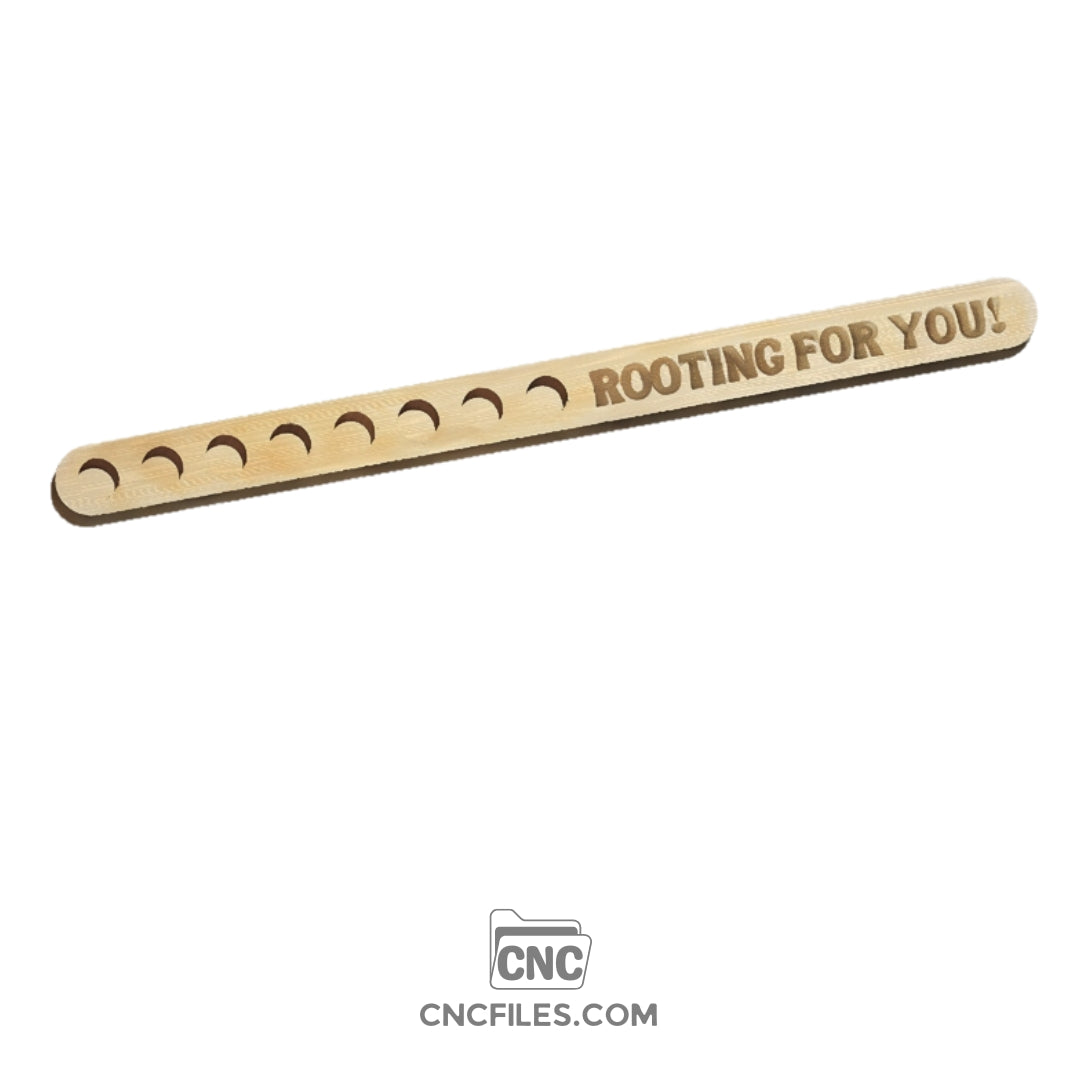 An image of a CNC file showing a Modern Propagation Station with the phrase "Rooting For You" engraved, designed with multiple slots to hold plant cuttings for in test tubes.