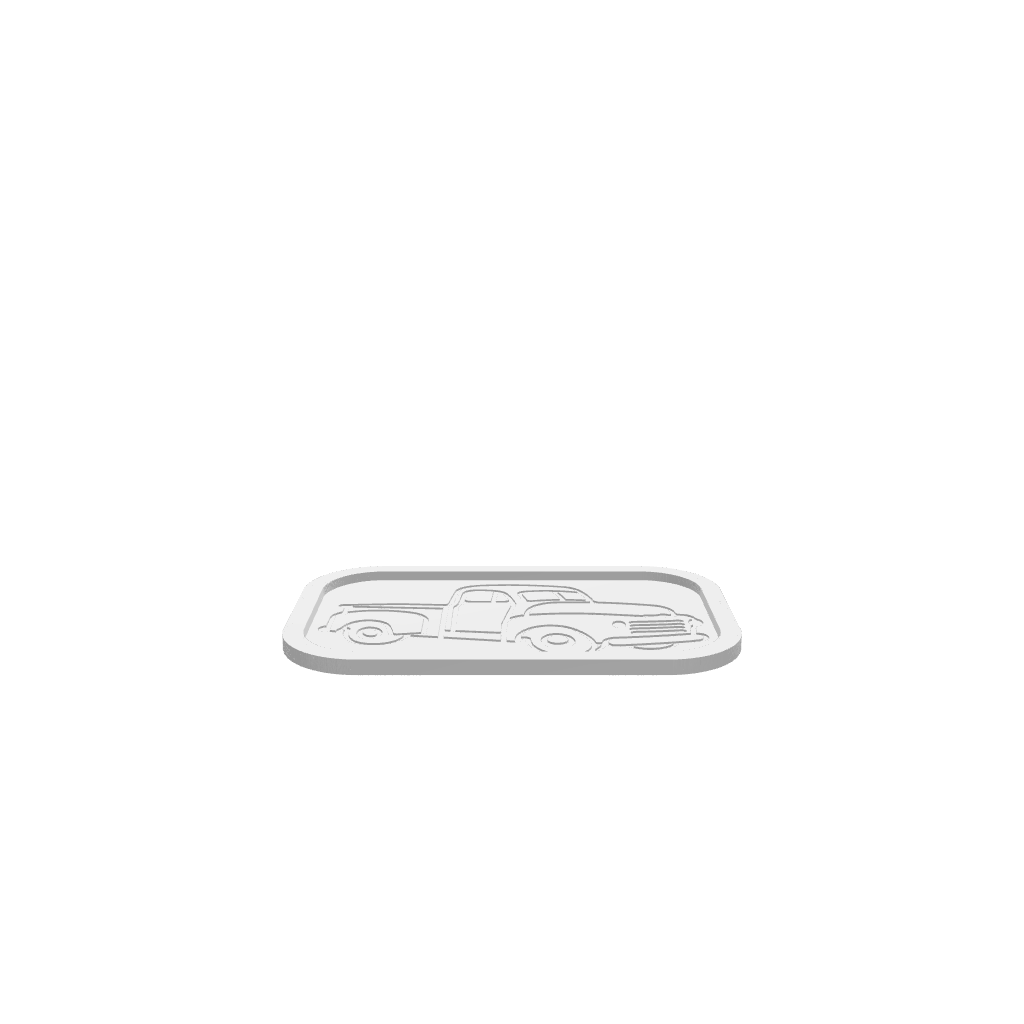 A 3D render of CNC file showing a rectangular tray featuring an antique farm truck engraved in the base